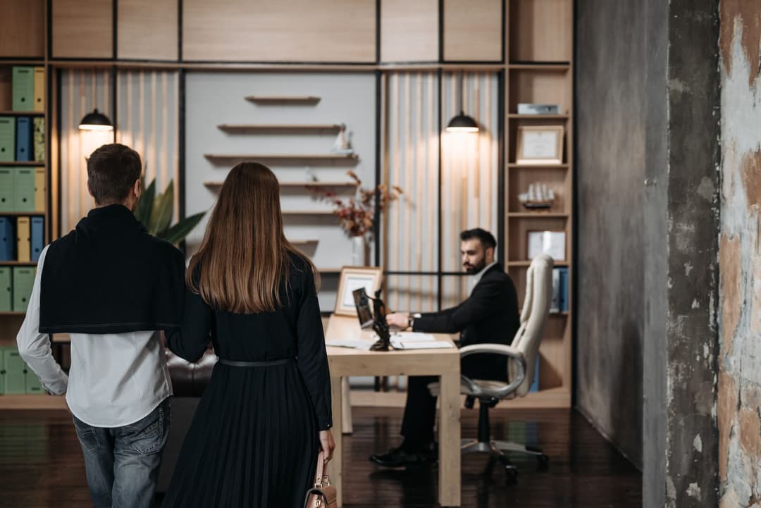 Contemporary law firm reception and workspace with warm professional lighting
